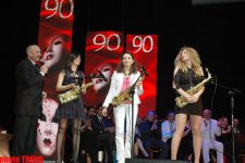 Известный саксофонист Ариф Джахангиров "нанес тройной удар" Сафуре (фотосессия)