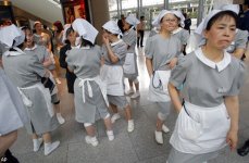 Число жертв землетрясения в Японии достигло 95 человек (версия 8)(ФОТО)