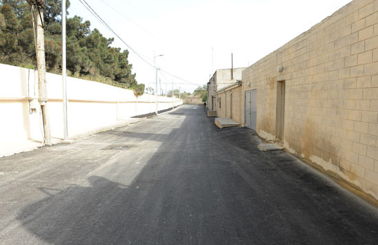 Президент Ильхам Алиев: Бакинские поселки должны отличаться своей современностью, красотой и чистотой (версия 2) (ФОТО)