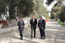 Президент Ильхам Алиев: Бакинские поселки должны отличаться своей современностью, красотой и чистотой (версия 2) (ФОТО)