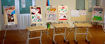 "Трагедия в Ходжалы" в работах юных художников (фотосессия)