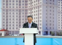 Президент Азербайджана принял участие в церемонии распределения квартир в построенном для журналистов здании (ФОТО)