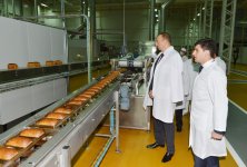 Президент Азербайджана принял участие в открытии хлебозавода и парка в Хатаинском районе Баку (ФОТО)