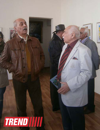 В Баку открылась выставка карикатур Адиля Эльчина (ФОТО)