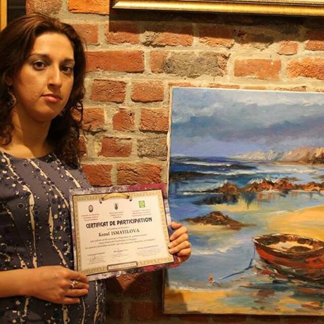 Кенуль Исмайлова с диагнозом ДЦП творит свои шедевры: "Главное - никогда не унывать" (ФОТО)