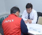 Делегации различных стран проходят аккредитацию на Кубок мира по прыжкам на батуте в Баку (ФОТОРЕПОРТАЖ)