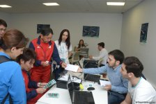 Делегации различных стран проходят аккредитацию на Кубок мира по прыжкам на батуте в Баку (ФОТОРЕПОРТАЖ)