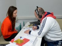 Делегации различных стран проходят аккредитацию на Кубок мира по прыжкам на батуте в Баку (ФОТОРЕПОРТАЖ)