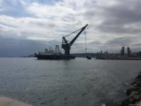 Как очищают Бакинскую бухту (ФОТО, ВИДЕО)