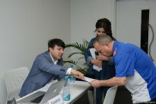 Делегации различных стран проходят аккредитацию на Кубок мира по спортивной гимнастике в Баку (ФОТОРЕПОРТАЖ)