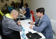 Делегации различных стран проходят аккредитацию на Кубок мира по спортивной гимнастике в Баку (ФОТОРЕПОРТАЖ)