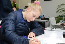 Делегации различных стран проходят аккредитацию на Кубок мира по спортивной гимнастике в Баку (ФОТОРЕПОРТАЖ)