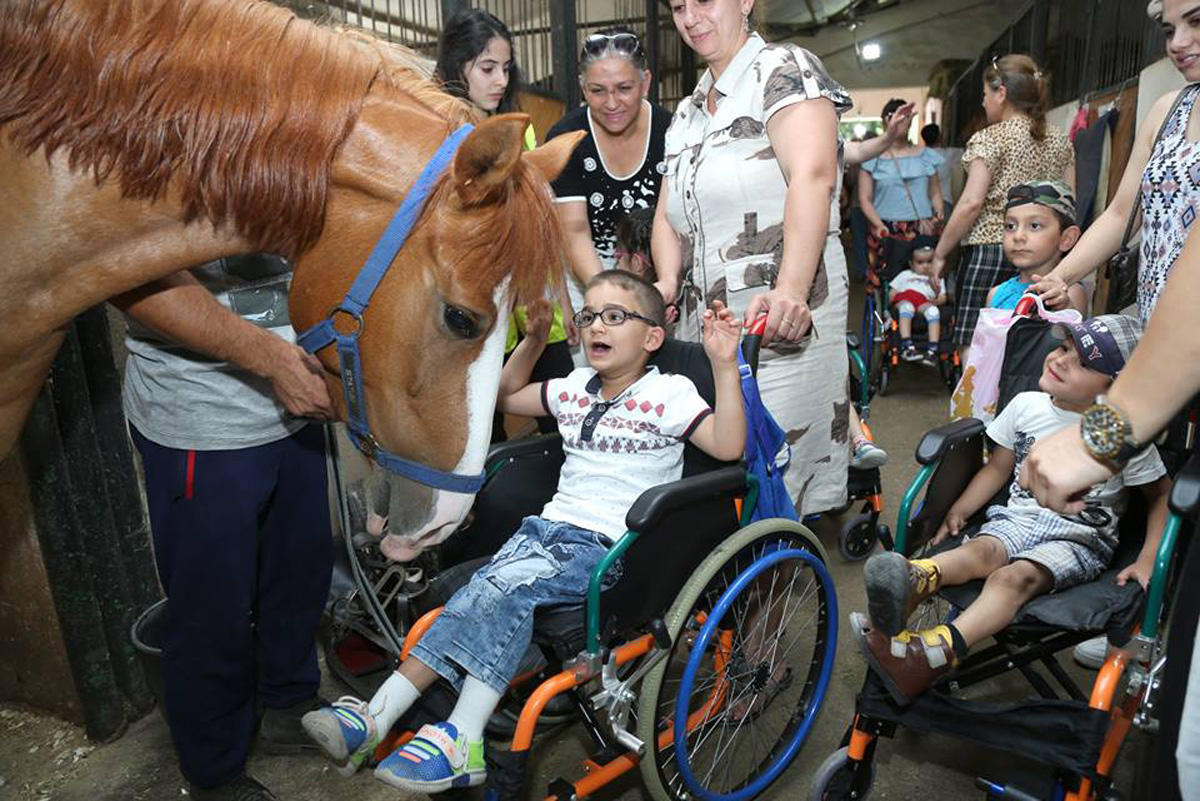 Дети с синдромом Дауна и ДЦП провели акцию в поддержку Гаджи Нурана Гусейнова (ФОТО)