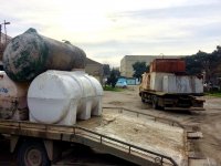 В Баку с крыш домов демонтируются водяные баки (ФОТО)