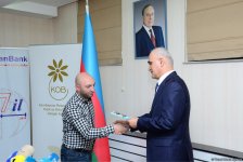 57 предпринимателей сгоревшего в Баку т/ц "Диглас" уже получили финансовую помощь - министр (ФОТО)