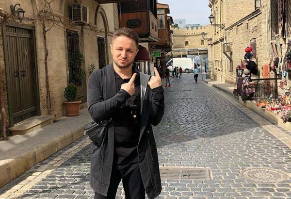 Участник российского "Голоса" снимает клип в Баку (ФОТО)