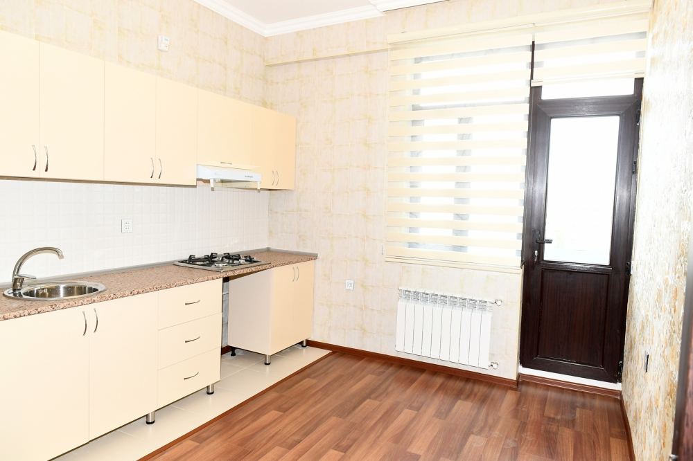 Президент Ильхам Алиев и Первая леди Мехрибан Алиева  приняли участие в церемонии предоставления квартир и автомобилей семьям шехидов и инвалидам войны в Баку (ФОТО/ВИДЕО) (Версия 2)