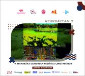 На тротуаре одной из бакинских улиц появился вернисаж (ФОТО)