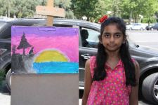 На тротуаре одной из бакинских улиц появился вернисаж (ФОТО)