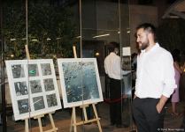 В Баку прошел аукцион: как азербайджанские фотографы помогают утилизировать старые батарейки (ФОТО)