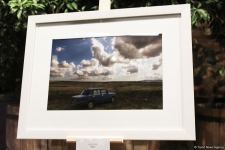 В Баку прошел аукцион: как азербайджанские фотографы помогают утилизировать старые батарейки (ФОТО)