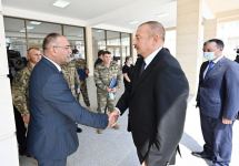 Президент Азербайджана Ильхам Алиев и Первая леди Мехрибан Алиева приняли участие в церемонии предоставления квартир и автомобилей семьям шехидов, инвалидам и героям Отечественной войны в Абшеронском районе (ФОТО/ВИДЕО)