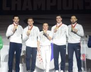 В Баку прошла церемония награждения победителей и призеров ЧМ среди команд в прыжках на акробатической дорожке и двойном мини-батуте (ФОТО)