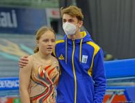 В Баку стартовал второй день 28-х Всемирных соревнований среди возрастных групп по прыжкам на батуте и тамблингу (ФОТО)