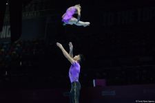 В Баку стартовал первый день Всемирных соревнований среди возрастных групп по акробатической гимнастике (ФОТО)