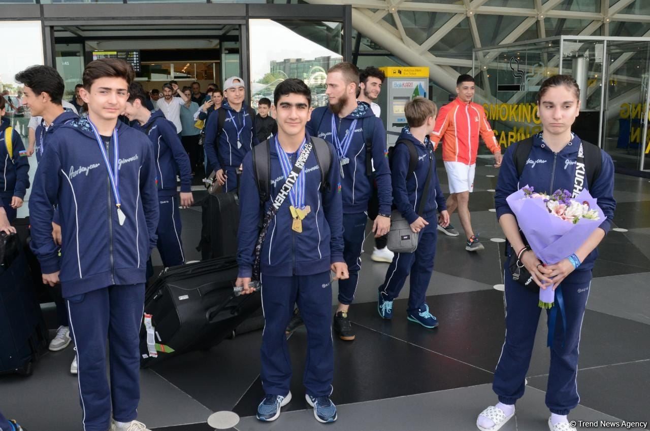 Азербайджанские гимнасты привезли в Баку из Италии медали Чемпионата Европы (ФОТО)