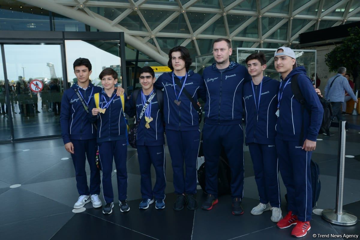 Азербайджанские гимнасты привезли в Баку из Италии медали Чемпионата Европы (ФОТО)