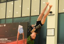 В Баку проходят соревнования чемпионата Азербайджана по прыжкам на акробатической дорожке (ФОТО)