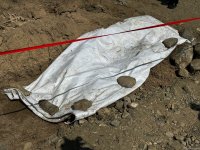 В Агдере проведен осмотр обнаруженного массового захоронения (ФОТО)