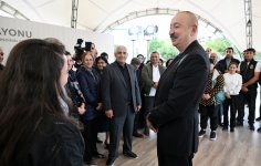 Президент Ильхам Алиев встретился с жителями поселков Гырмызы Базар, Гадрут и села Сос (ФОТО)