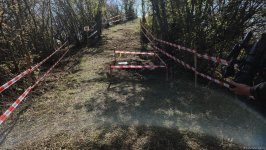 Участники международной конференции посетили массовое захоронение в Агдере (ФОТО)