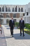 Президент Ильхам Алиев принял участие в открытии первого жилого комплекса, построенного в городе Зангилан (ФОТО)