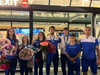 Призеры чемпионата мира по акробатической гимнастике вернулись в Азербайджан (ФОТО)