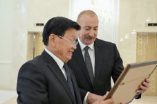 От имени Президента Ильхама Алиева дан официальный обед в честь Президента Лаоса (ФОТО)